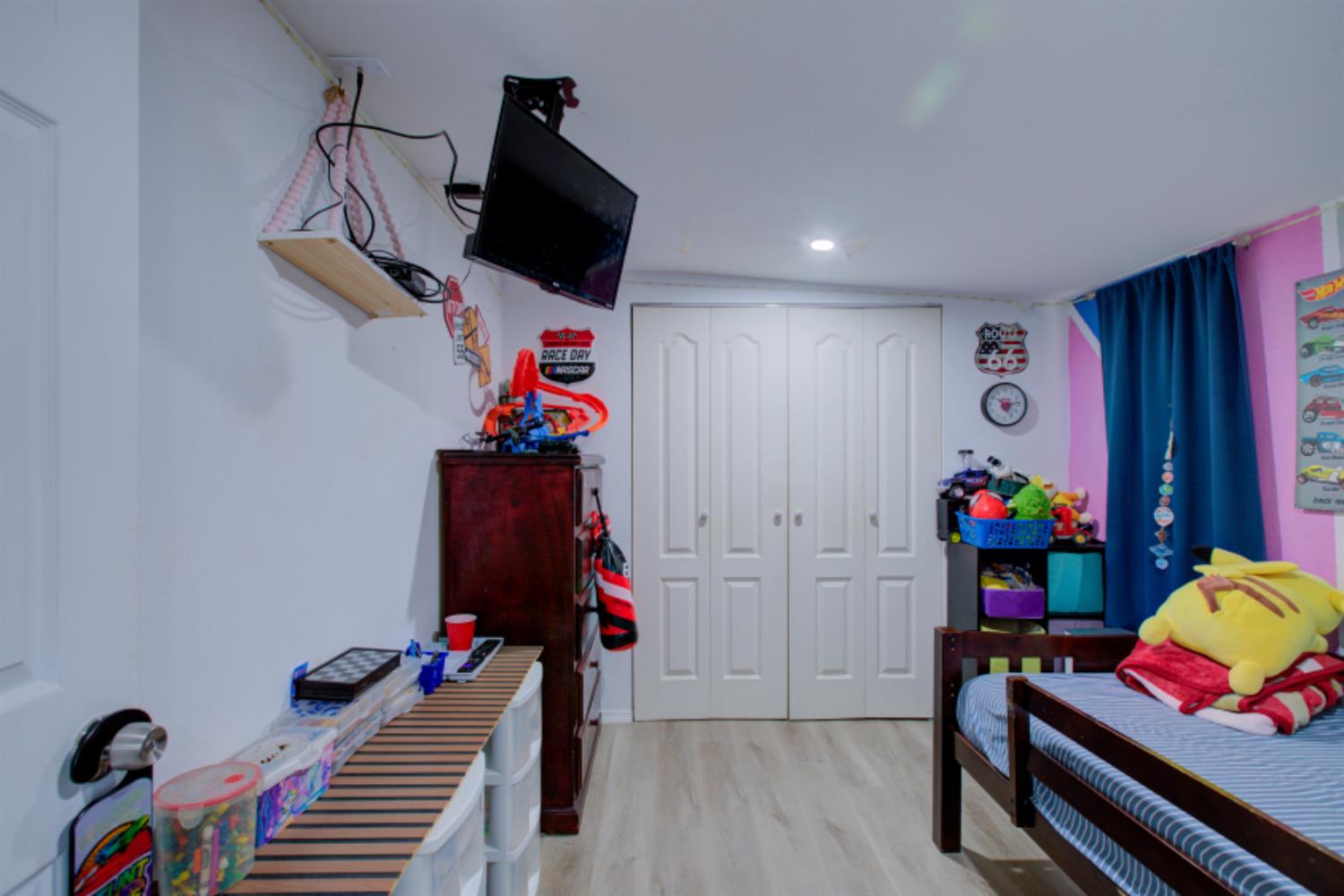 7139 Center Street Winton, CA 95388 - Photo 21 of 36 a room with furniture and wooden floor