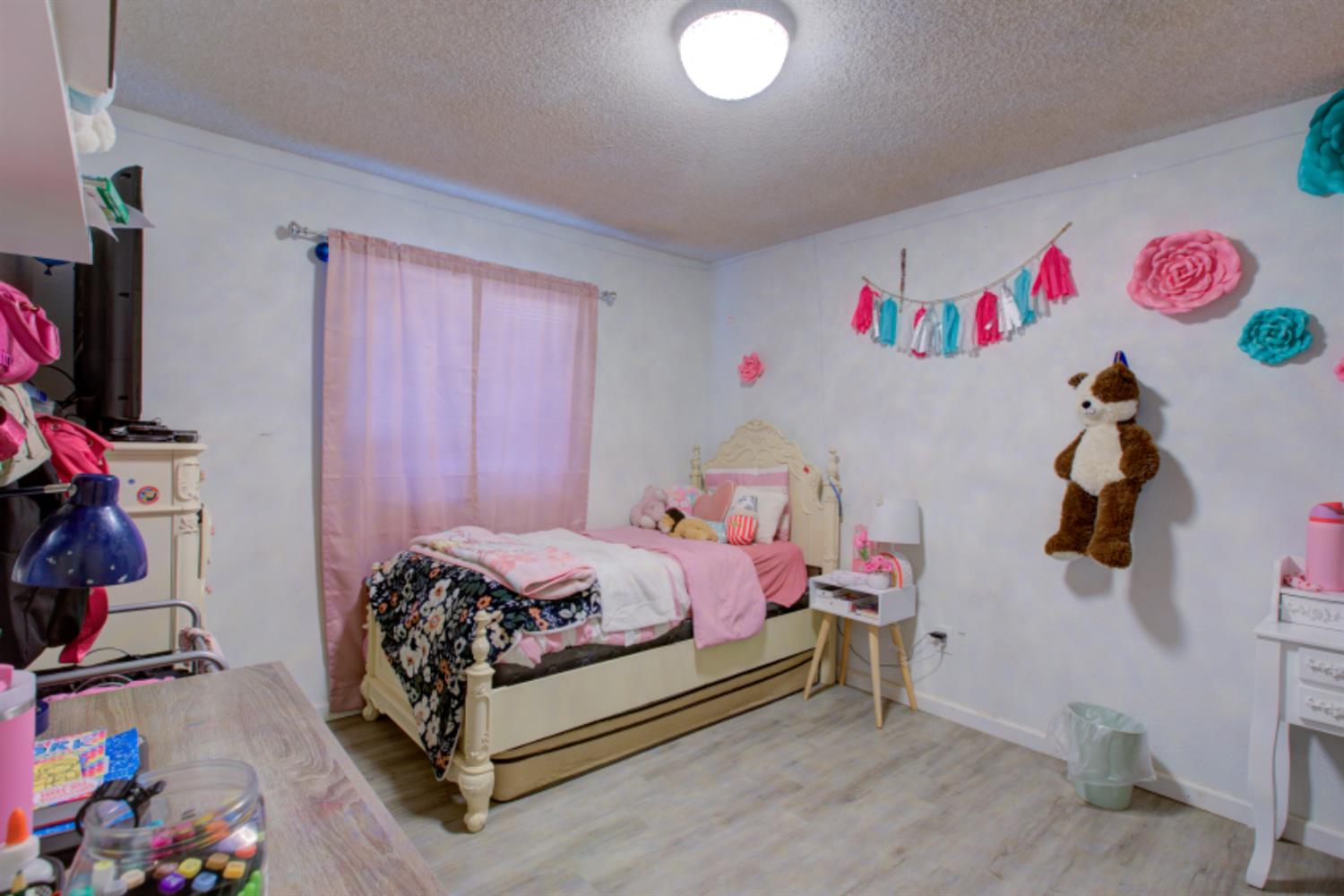 7139 Center Street Winton, CA 95388 - Photo 27 of 36 a bedroom with a bed and a window