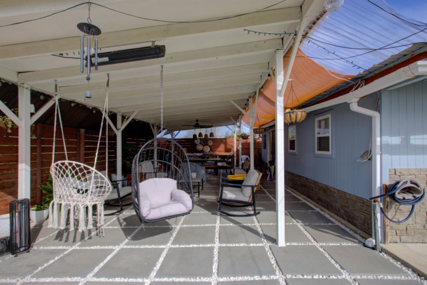 7139 Center Street Winton, CA 95388 - Photo 29 of 36 a view of a chairs and table in a patio