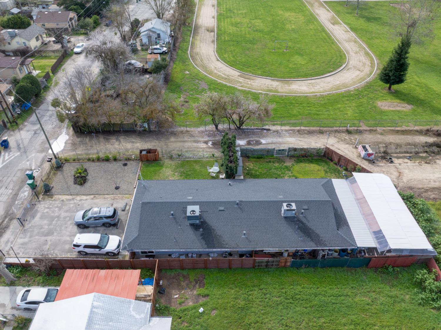 7139 Center Street Winton, CA 95388 - Photo 35 of 36 an aerial view of residential house with outdoor space and swimming pool