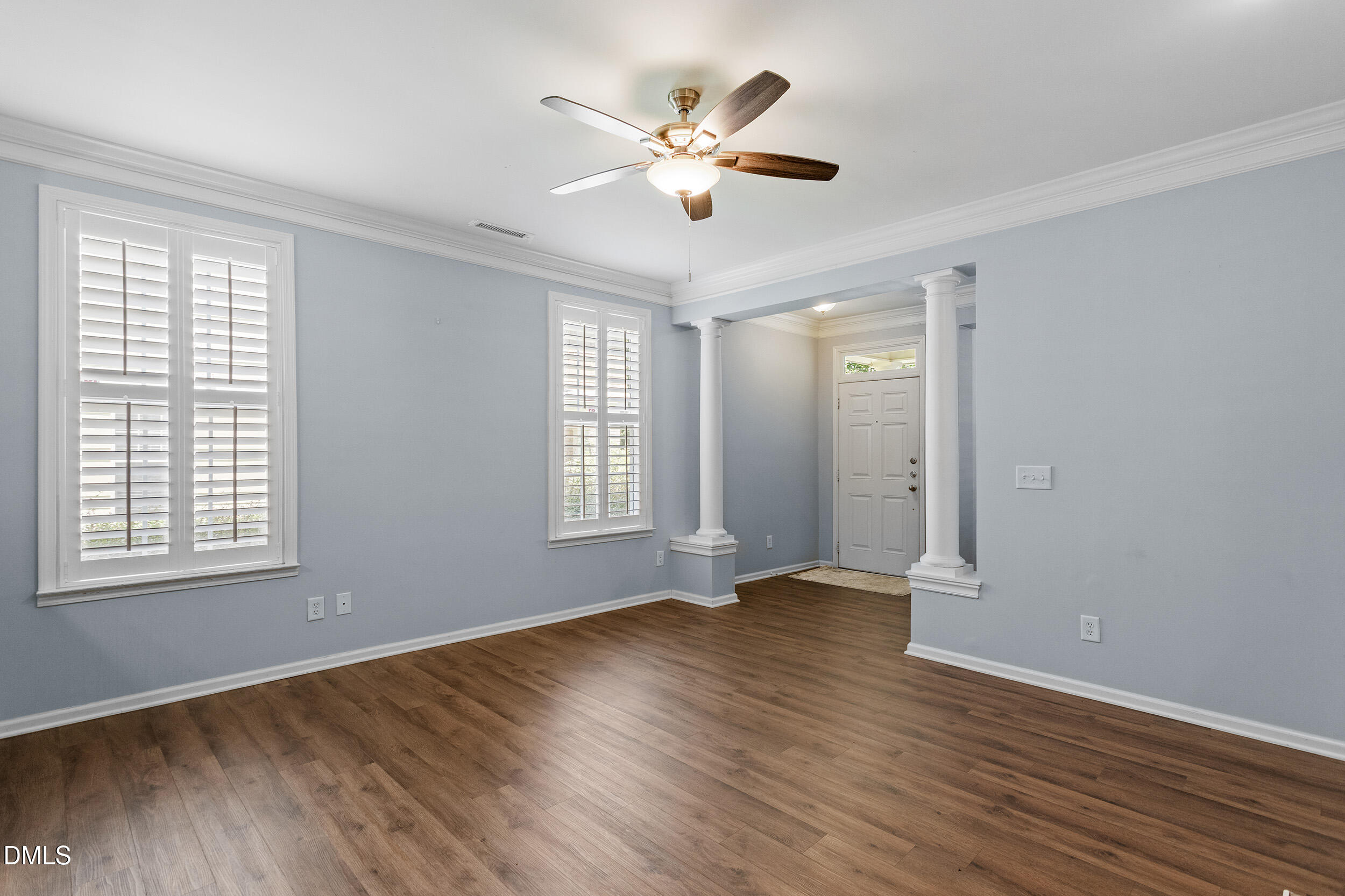 3147 Rapid Falls Road Cary, NC 27519 - Photo 12 of 34 a view of an empty room with wooden floor and a window