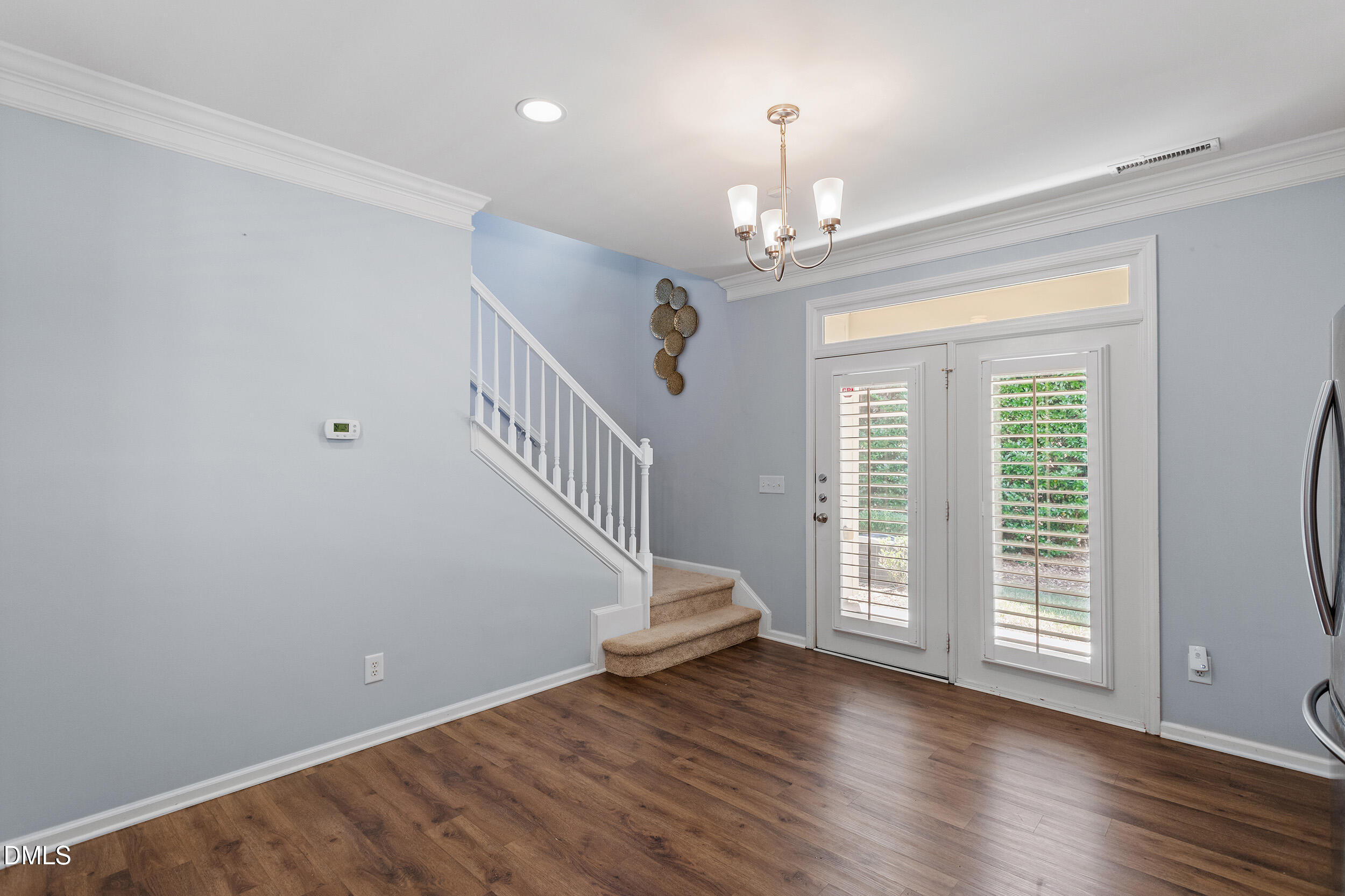 3147 Rapid Falls Road Cary, NC 27519 - Photo 16 of 34 wooden floor in an empty room with a window