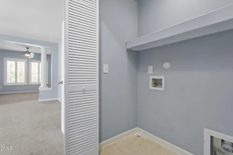 an empty room that has a window