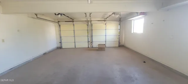 a view of a livingroom with furniture and a fireplace