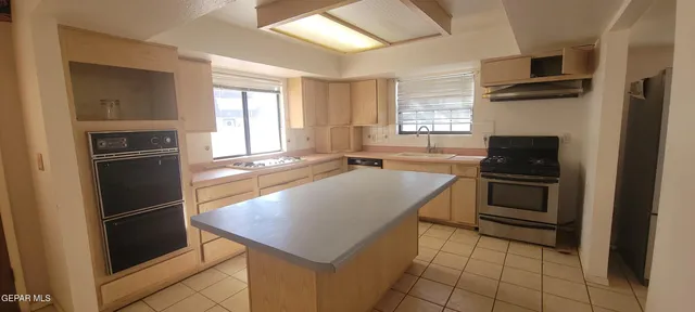 a bathroom with a sink toilet and mirror