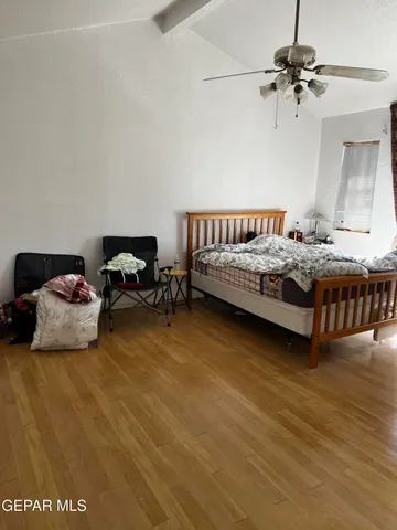 a view of a swimming pool with a chair