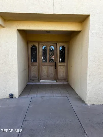 a view of a bathroom with a sink and mirror
