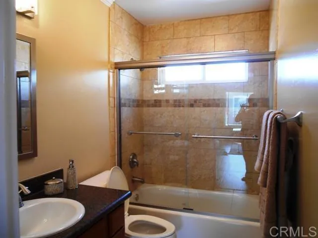 a bathroom with a sink and bathtub