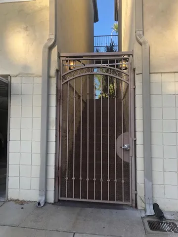 a view of a door with wooden wall
