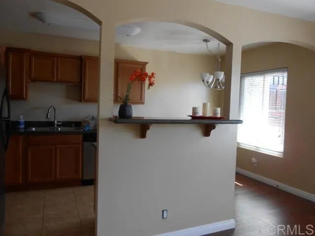 a view of kitchen with wooden floor