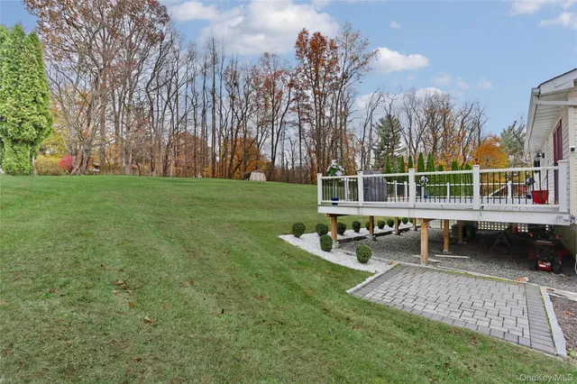 a small barn with a small yard