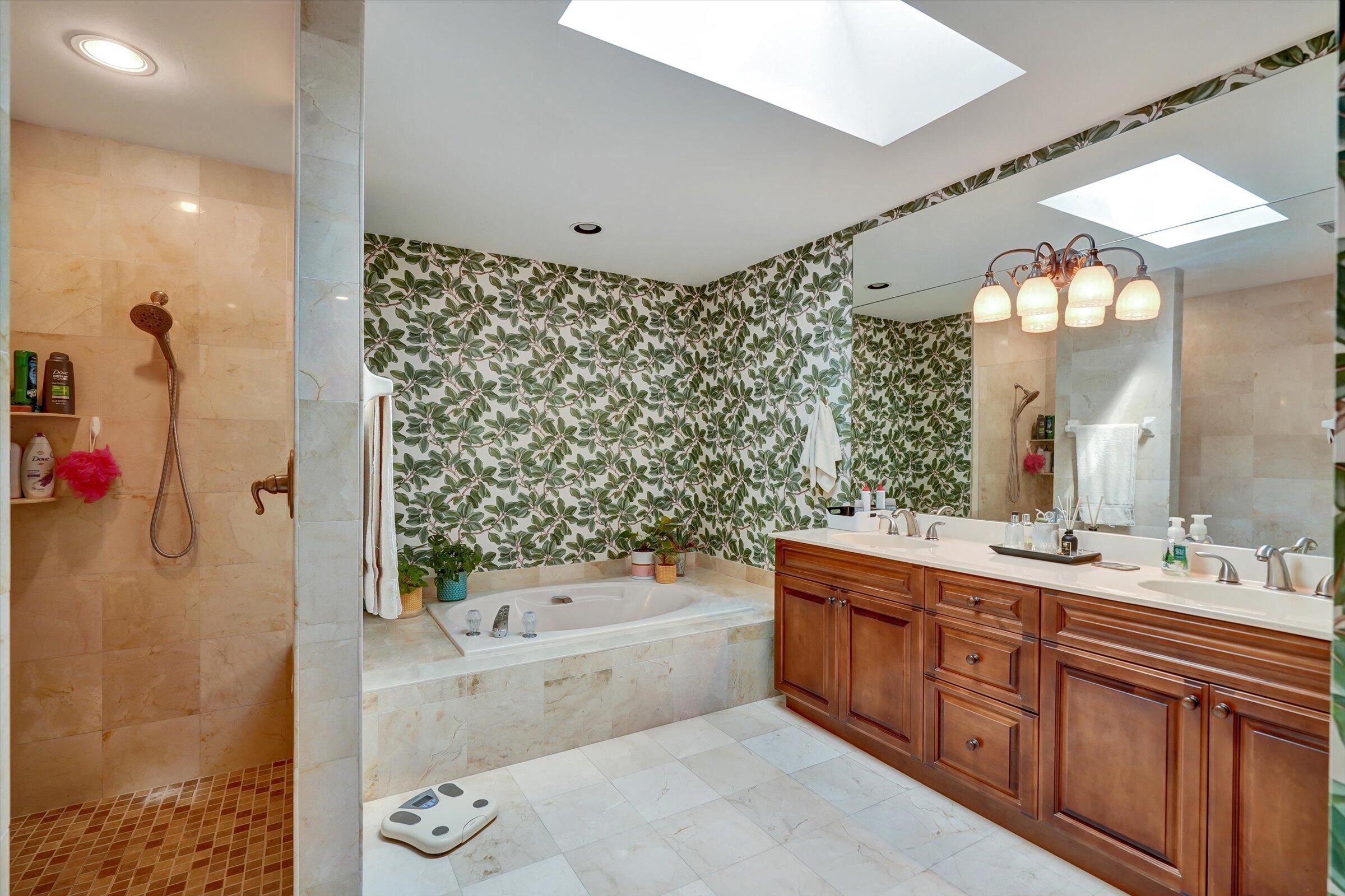 316 River Edge Road Jupiter, FL 33477 - Photo 10 of 53 a bathroom with a tub sink and mirror