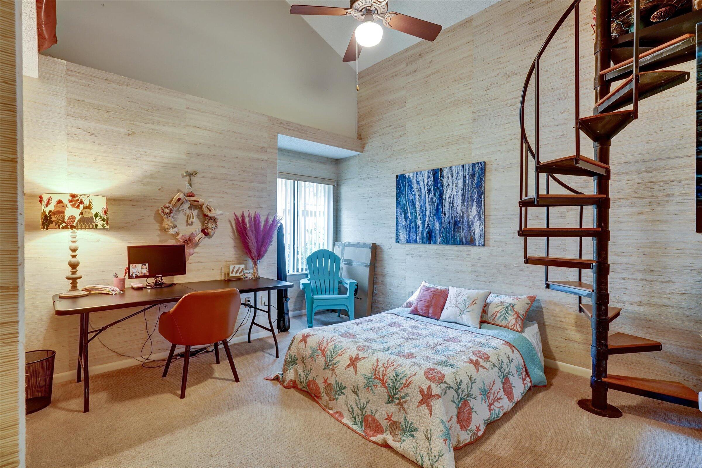 316 River Edge Road Jupiter, FL 33477 - Photo 12 of 53 a bed room with a bed and a chandelier