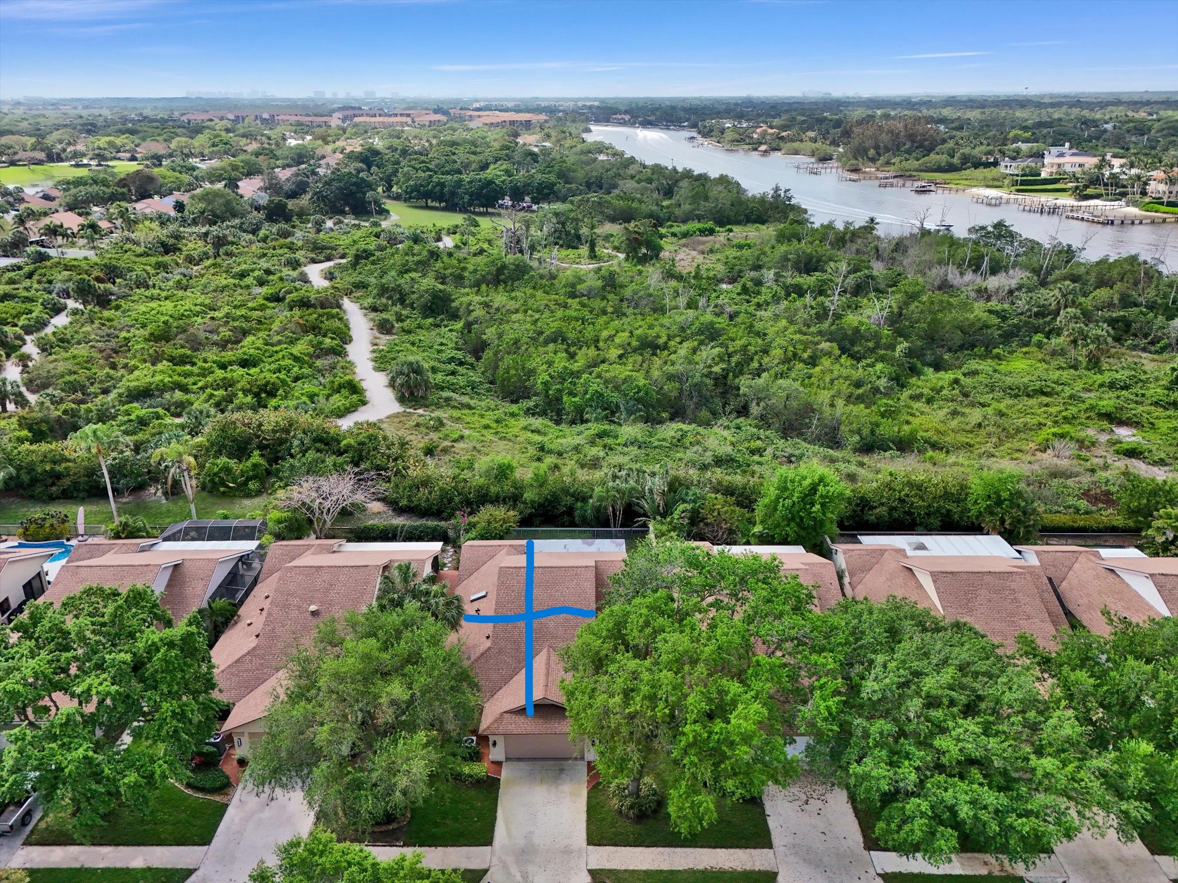 316 River Edge Road Jupiter, FL 33477 - Photo 15 of 53 an aerial view of a city with lots of residential buildings