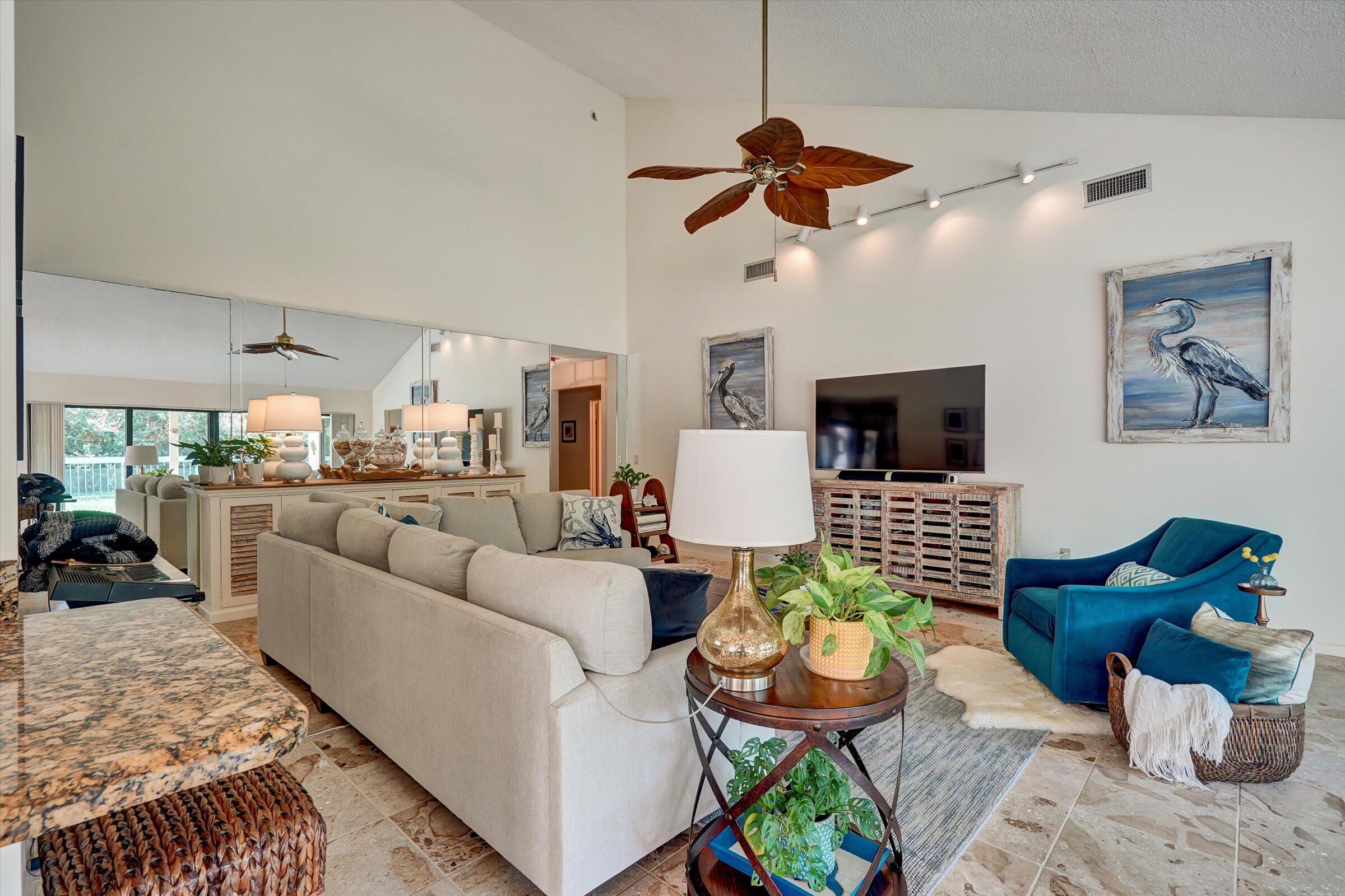 316 River Edge Road Jupiter, FL 33477 - Photo 23 of 53 a living room with furniture and a window