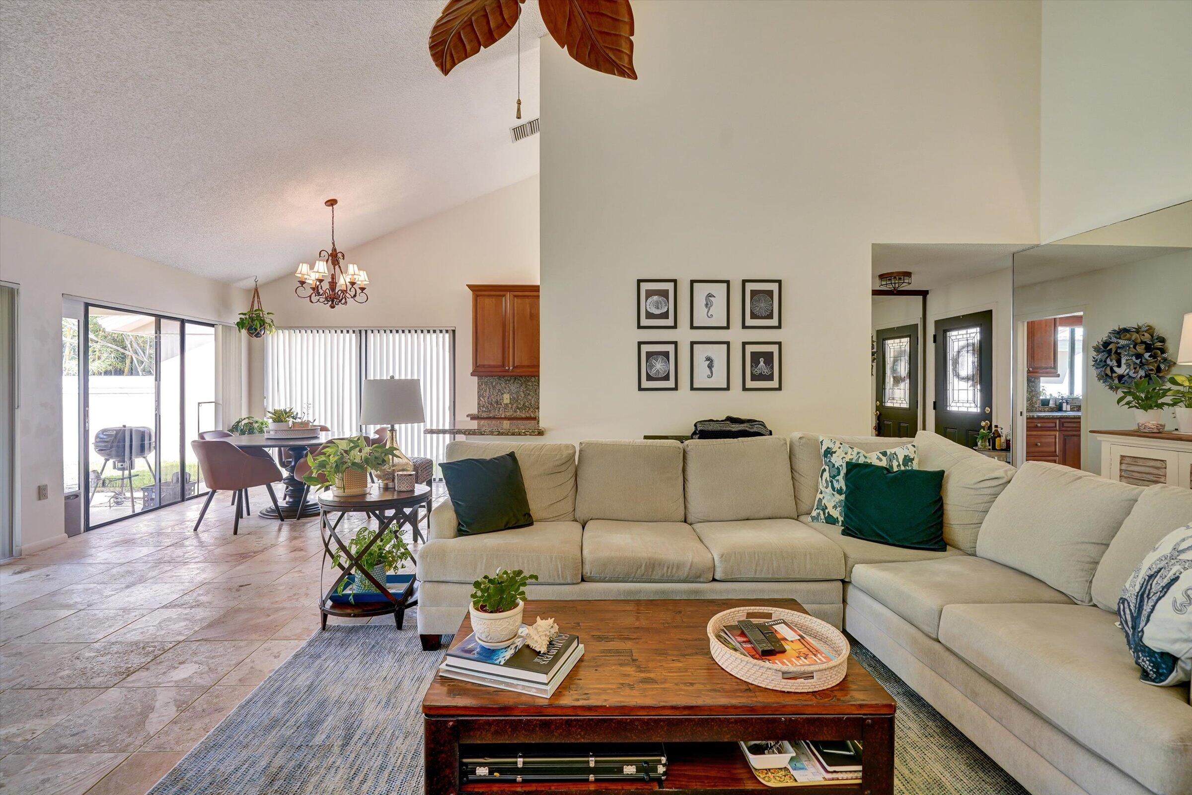 316 River Edge Road Jupiter, FL 33477 - Photo 24 of 53 a living room with furniture and wooden floor