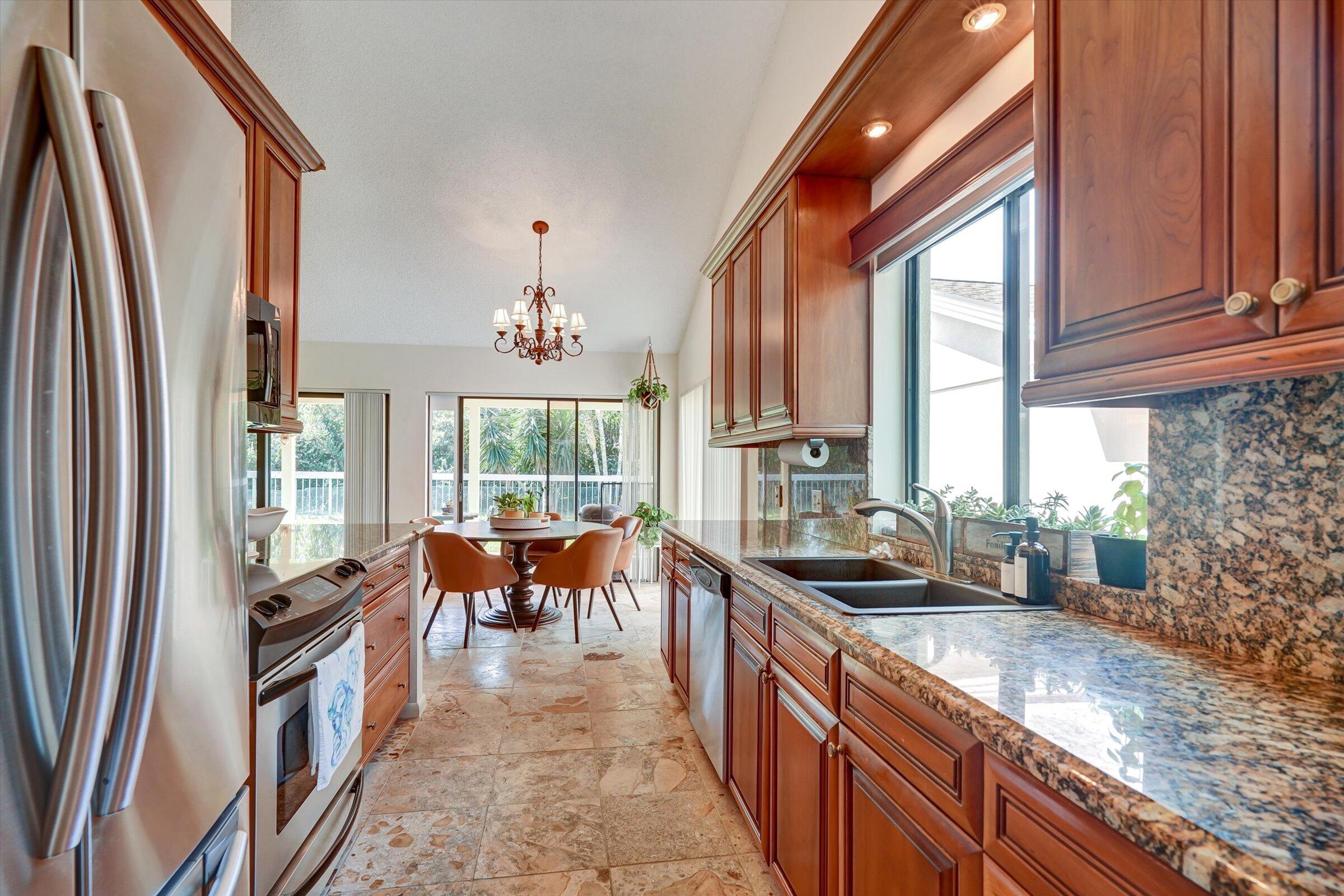 316 River Edge Road Jupiter, FL 33477 - Photo 26 of 53 a large kitchen with lots of counter top space