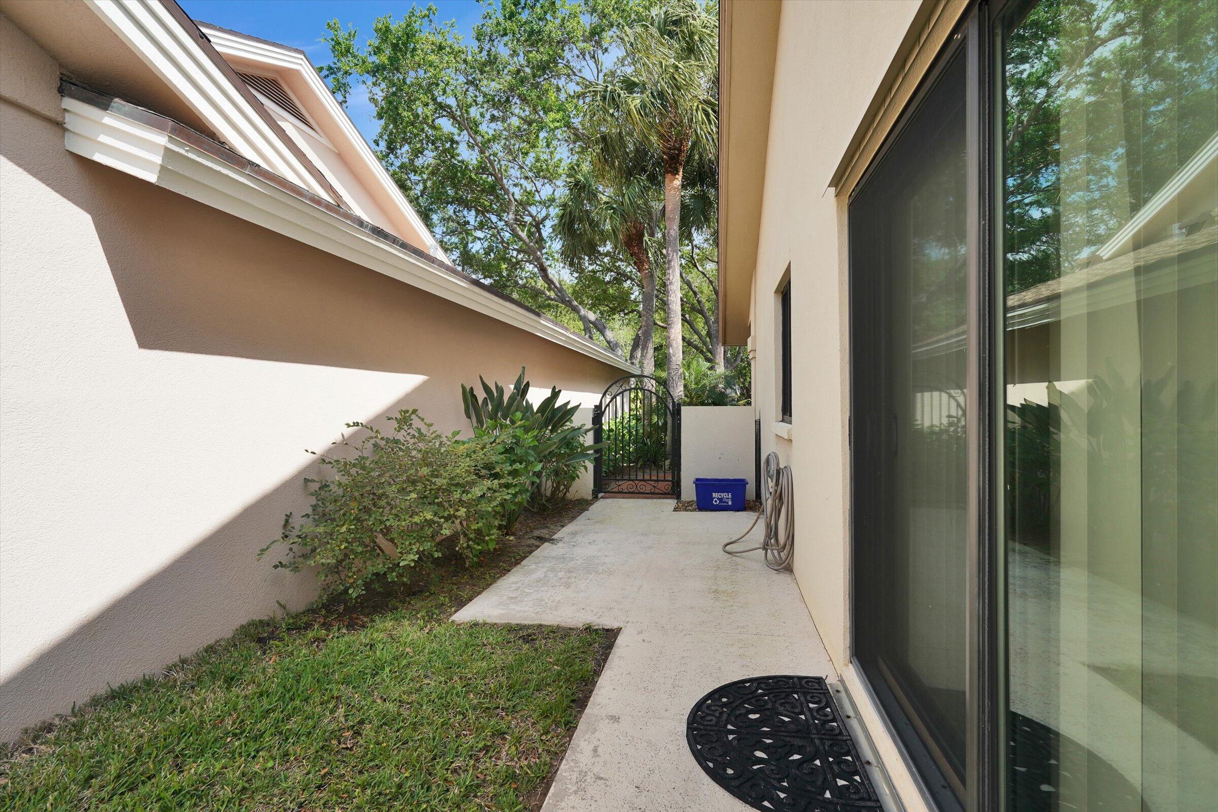 316 River Edge Road Jupiter, FL 33477 - Photo 27 of 53 a view of a back yard