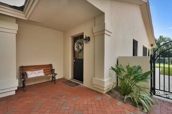 a view of entryway with wooden floor and a potted plant