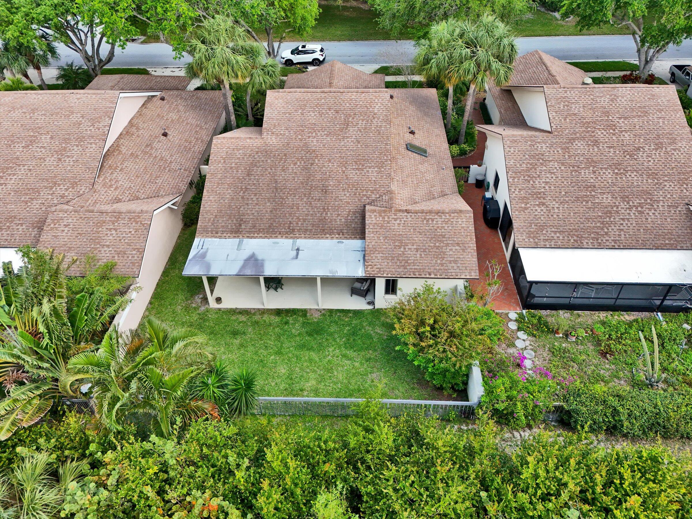 316 River Edge Road Jupiter, FL 33477 - Photo 33 of 53 an aerial view of multiple houses with yard