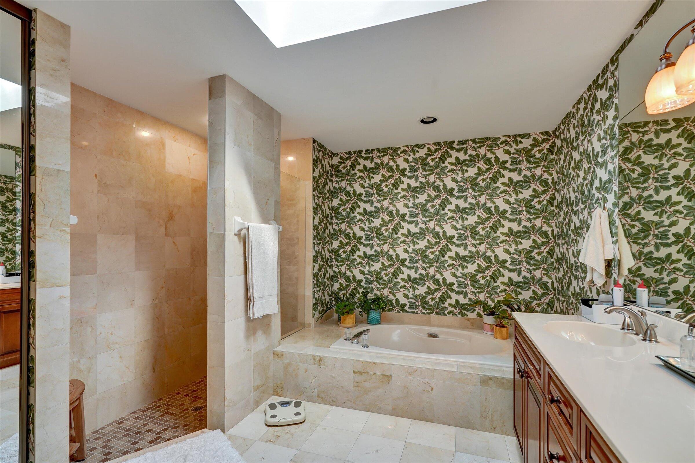 316 River Edge Road Jupiter, FL 33477 - Photo 37 of 53 a bathroom with a bathtub and shower