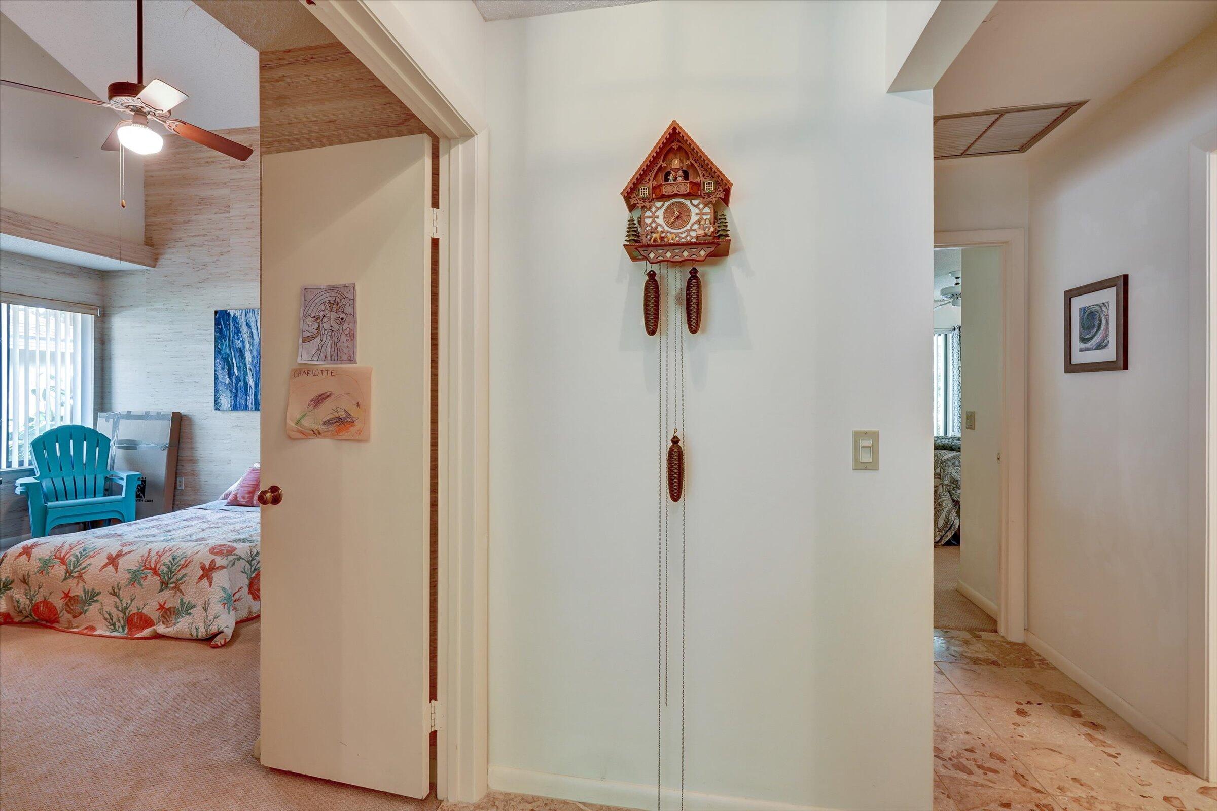 316 River Edge Road Jupiter, FL 33477 - Photo 41 of 53 a bedroom with a bed and a table
