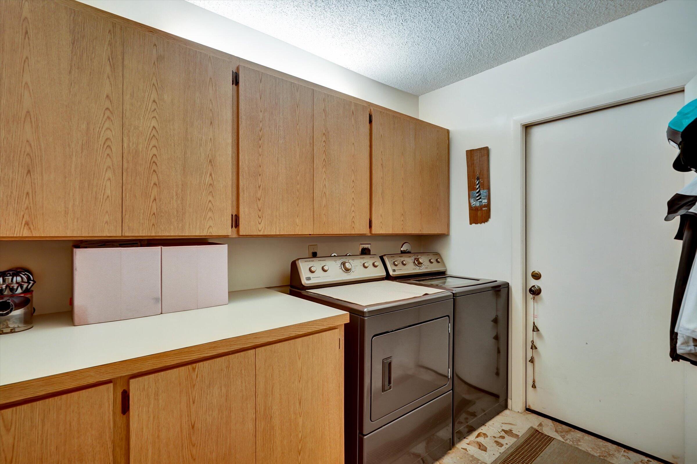 316 River Edge Road Jupiter, FL 33477 - Photo 44 of 53 Spacious Laundry Rm w/Tub