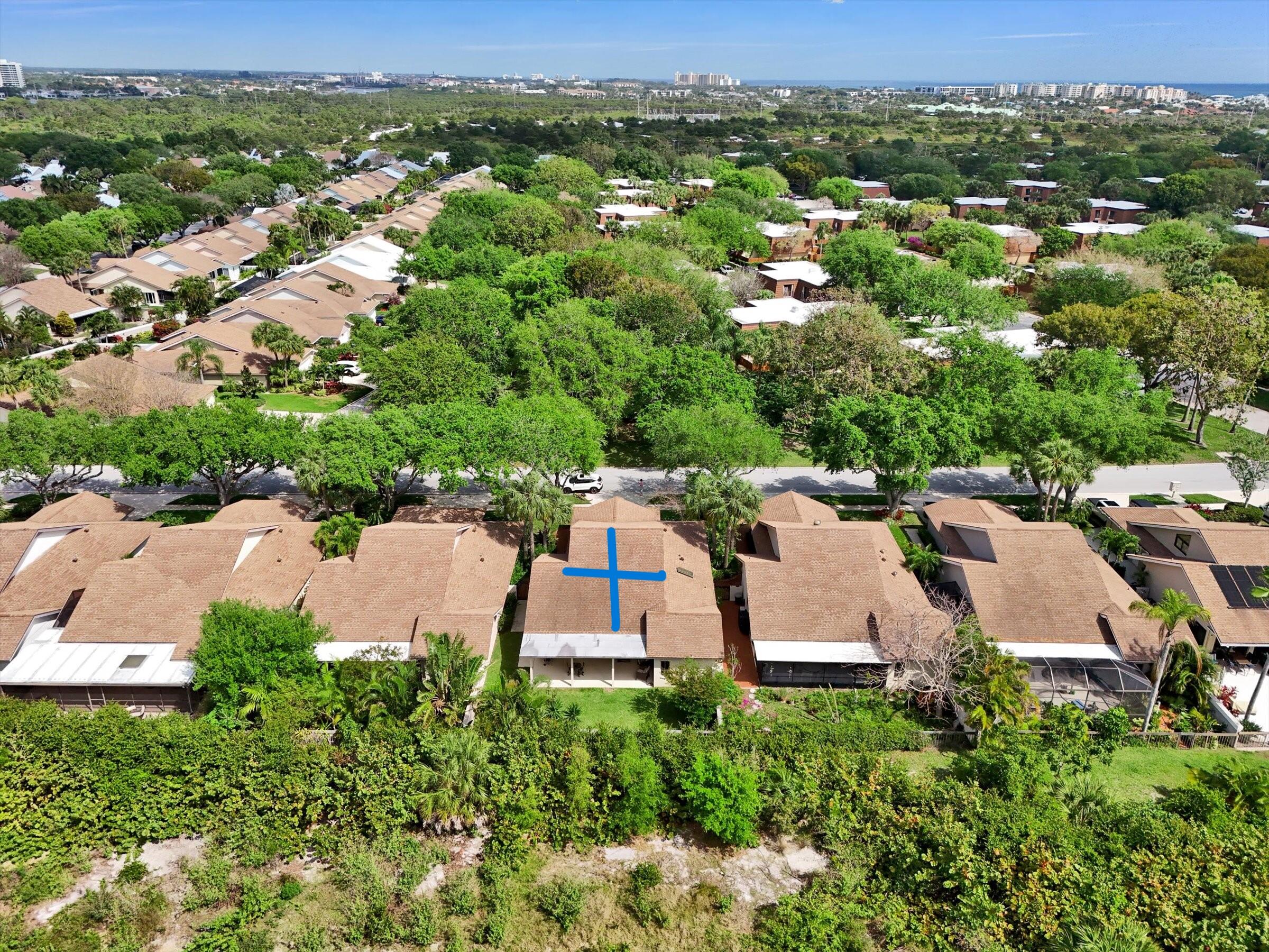 316 River Edge Road Jupiter, FL 33477 - Photo 49 of 53 an aerial view of a house with a yard