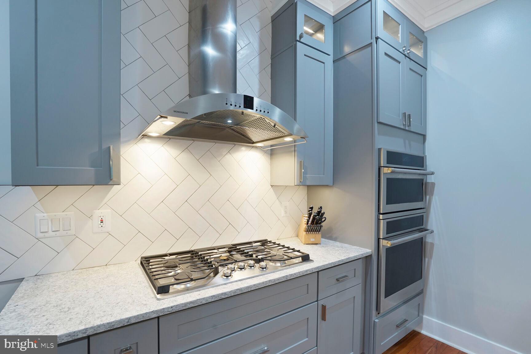 7045 Barbara Road Alexandria, VA 22315 - Photo 13 of 57 a kitchen with cabinets and appliances