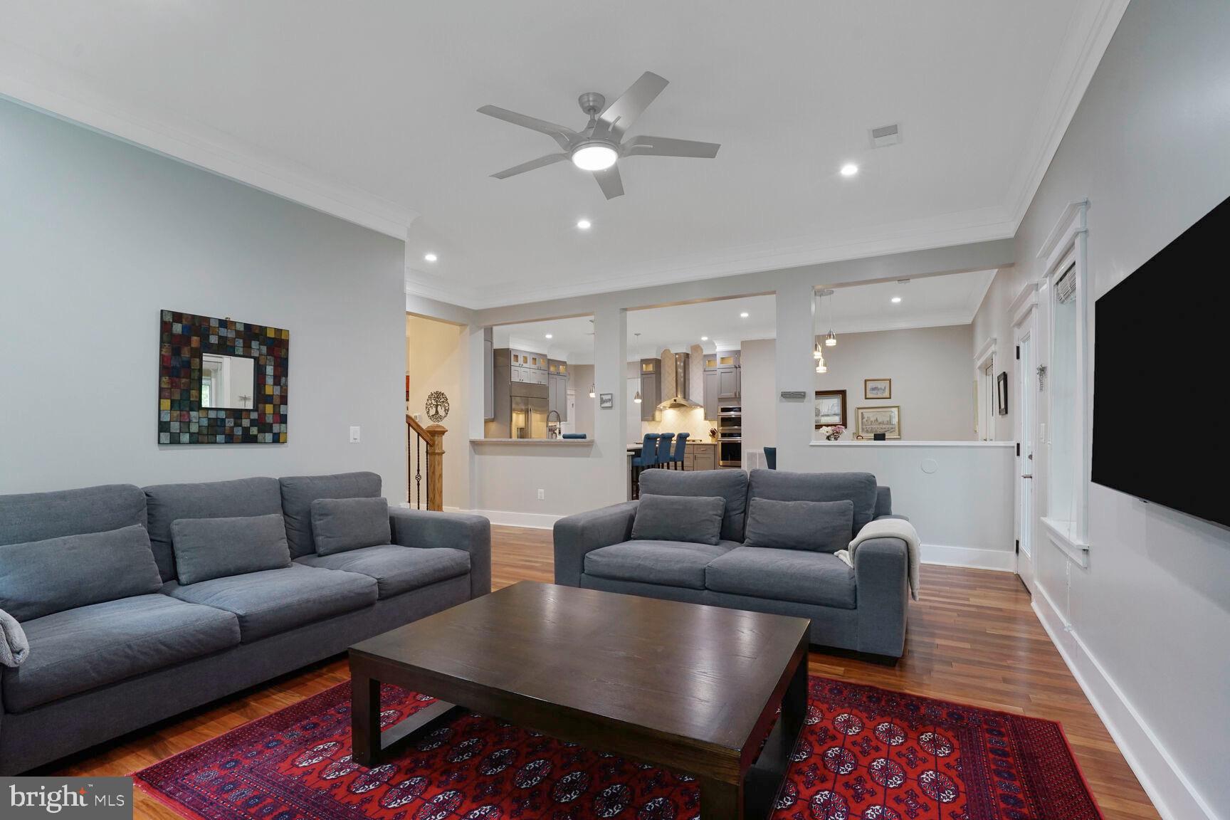 7045 Barbara Road Alexandria, VA 22315 - Photo 17 of 57 a living room with furniture and a flat screen tv