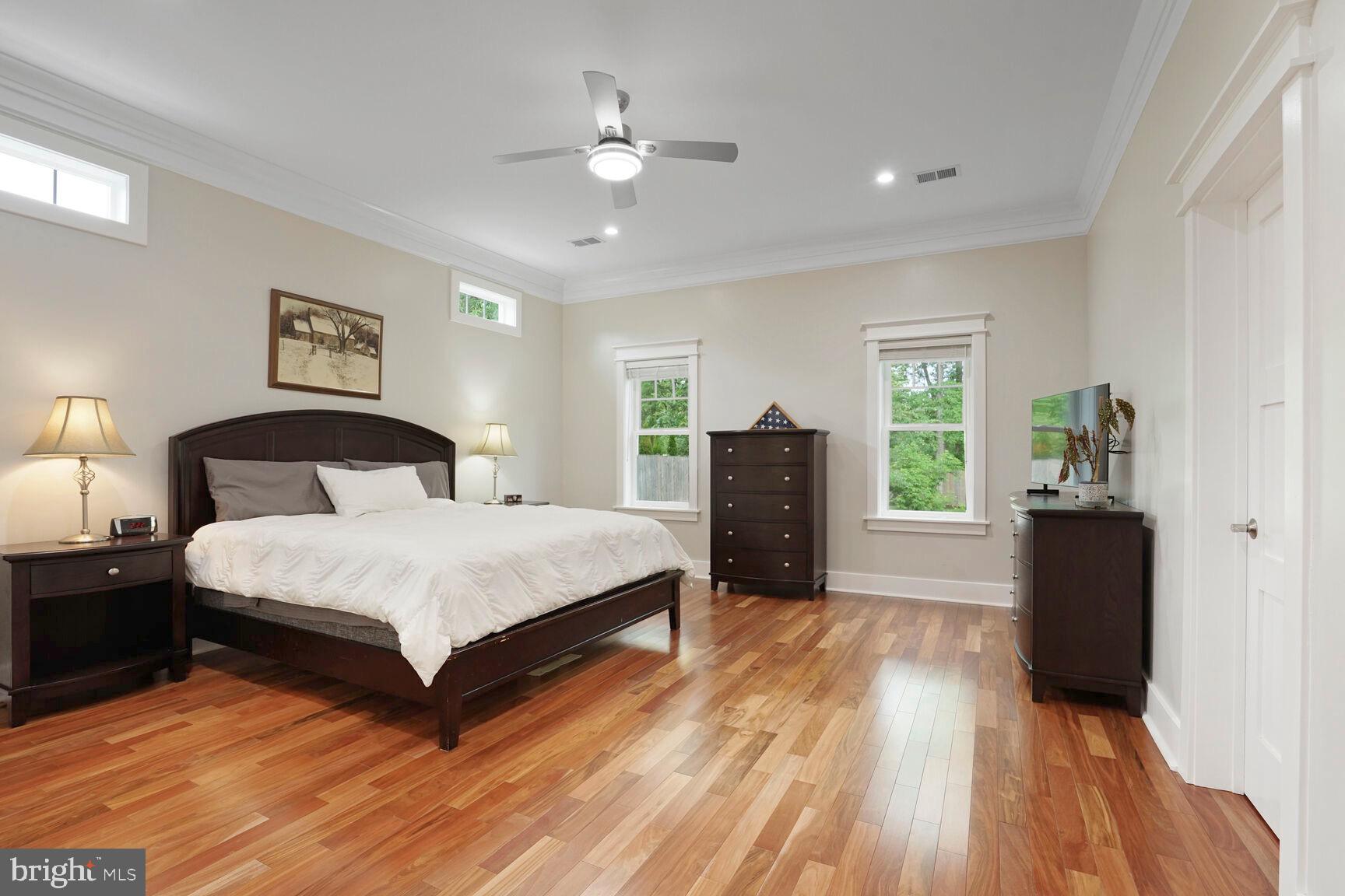 7045 Barbara Road Alexandria, VA 22315 - Photo 19 of 57 a spacious bedroom with a bed and a window