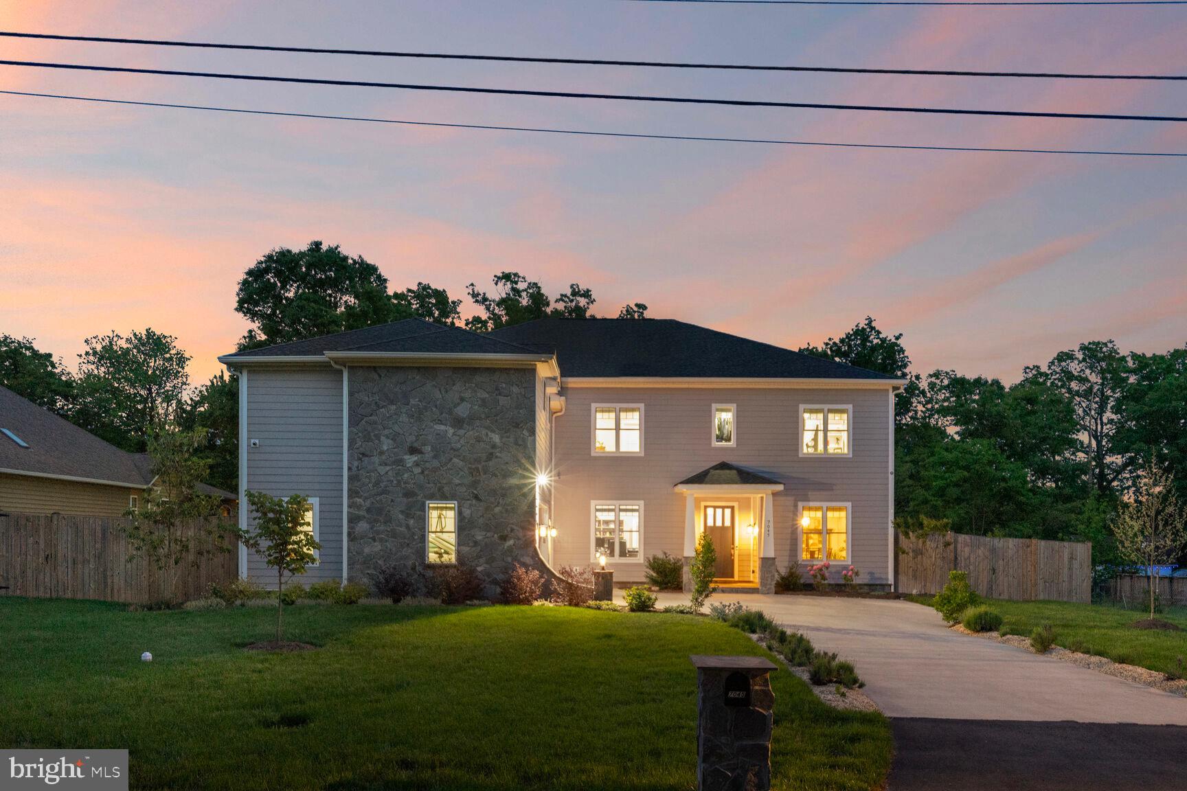 7045 Barbara Road Alexandria, VA 22315 - Photo 2 of 57 a front view of a house with a yard