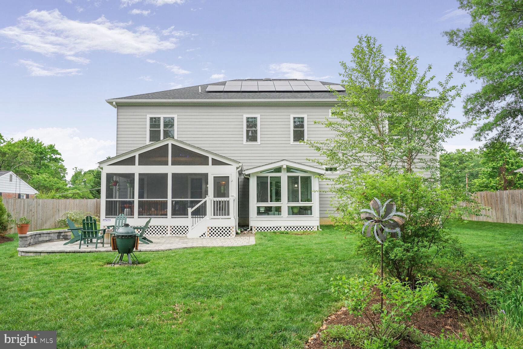 7045 Barbara Road Alexandria, VA 22315 - Photo 52 of 57 a front view of a house with a yard and porch