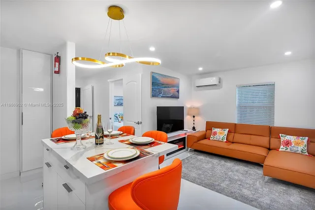 a bedroom with a bed and dresser