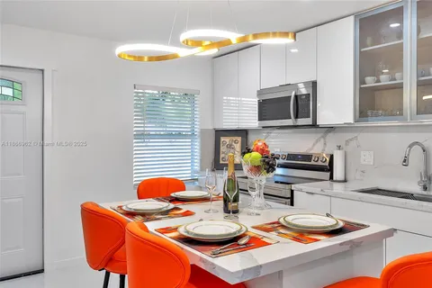 a bedroom with a bed and a cabinets