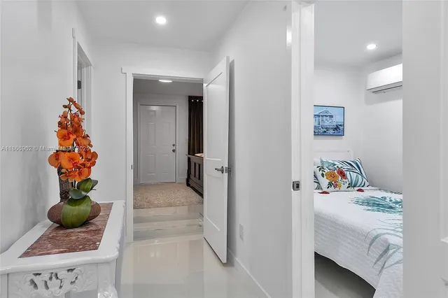 a backyard of a house with outdoor seating