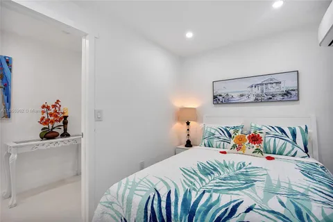 a view of a park with large trees