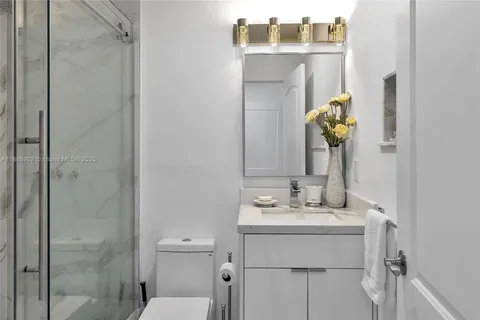 a house with a tree in front of it