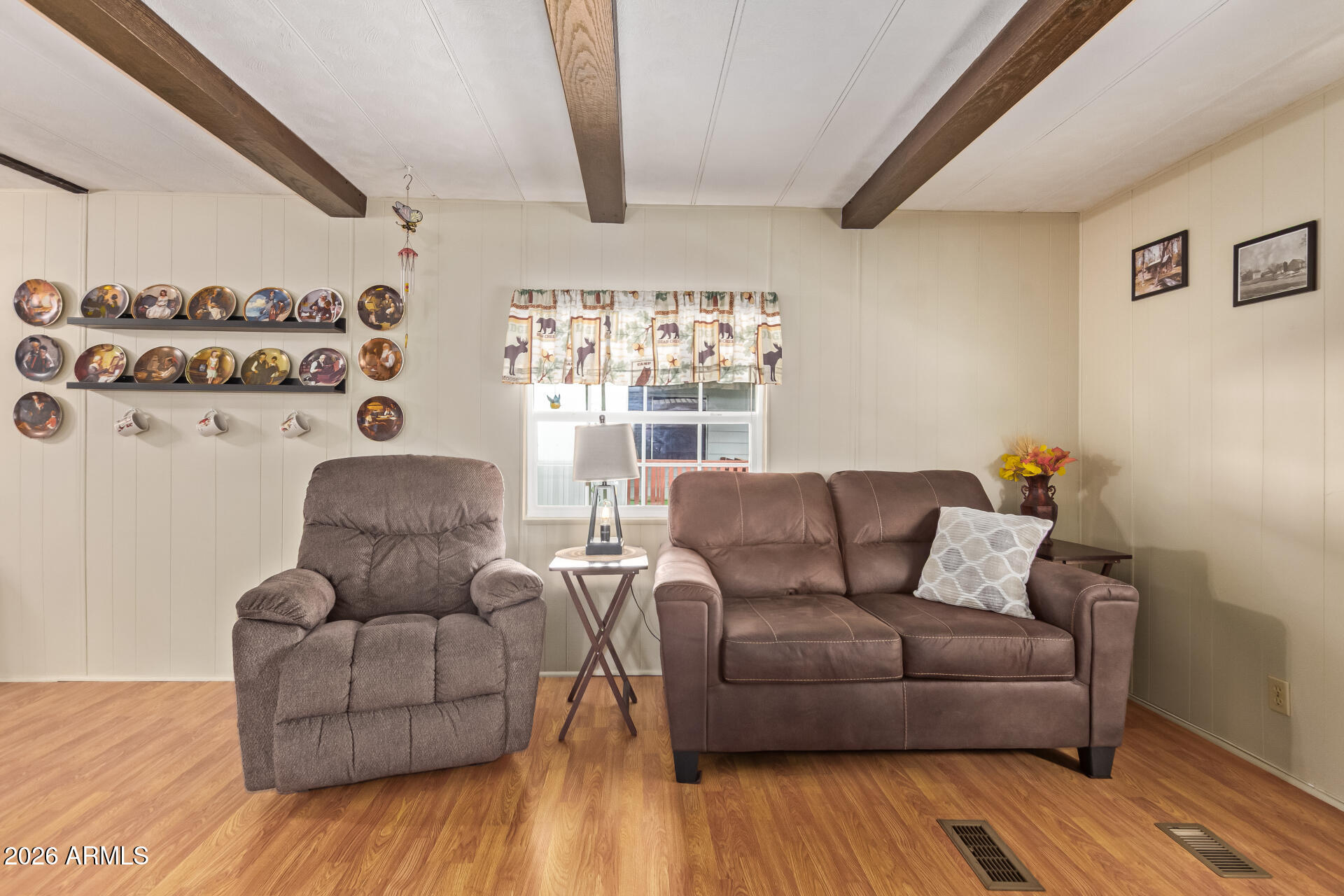 201 South Greenfield Road, Unit 291 Mesa, AZ 85206 - Photo 10 of 34 a living room with furniture and a large window