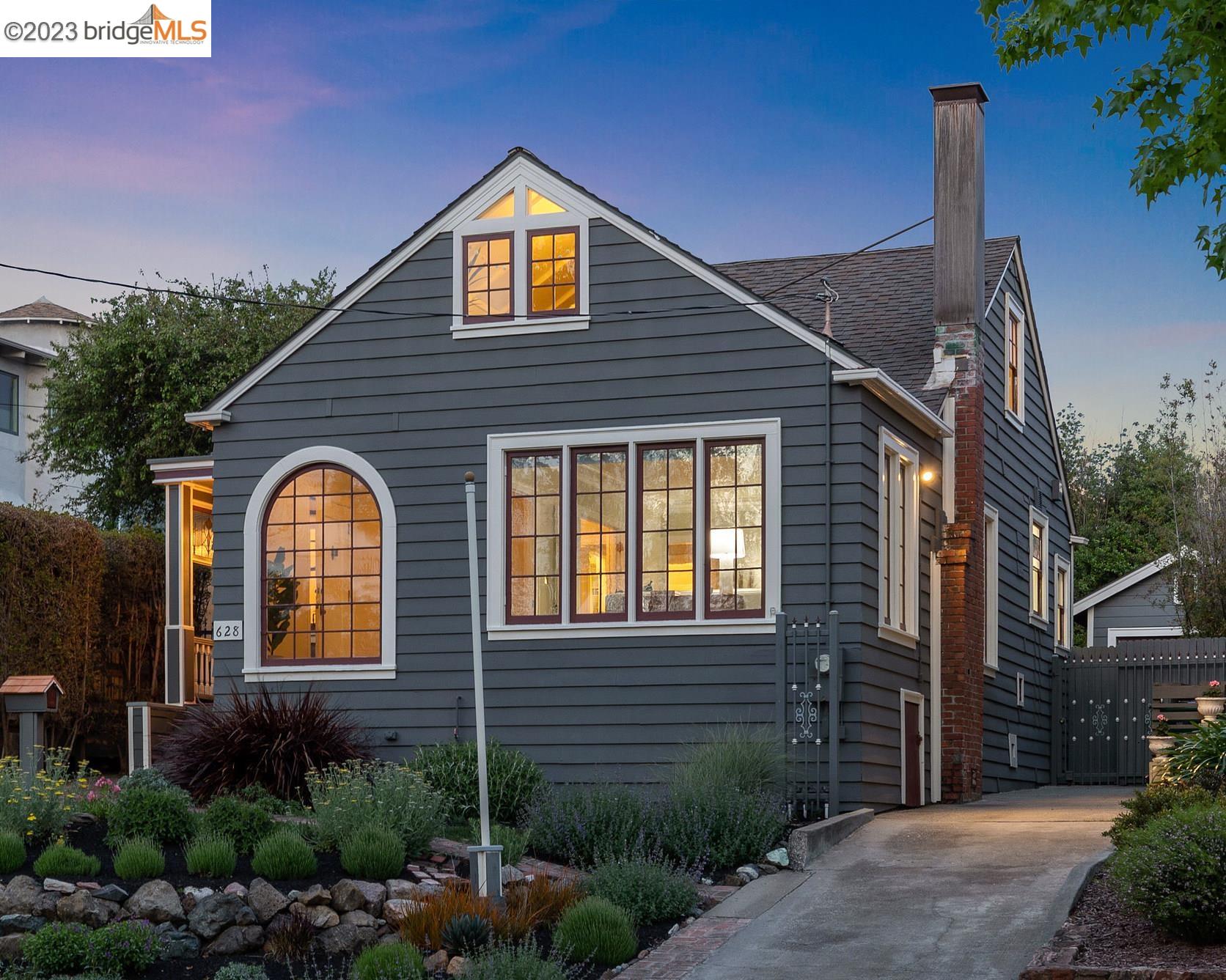 628 Montclair Avenue Oakland, CA 94610 - Photo 1 of 1 a front view of a house with garden