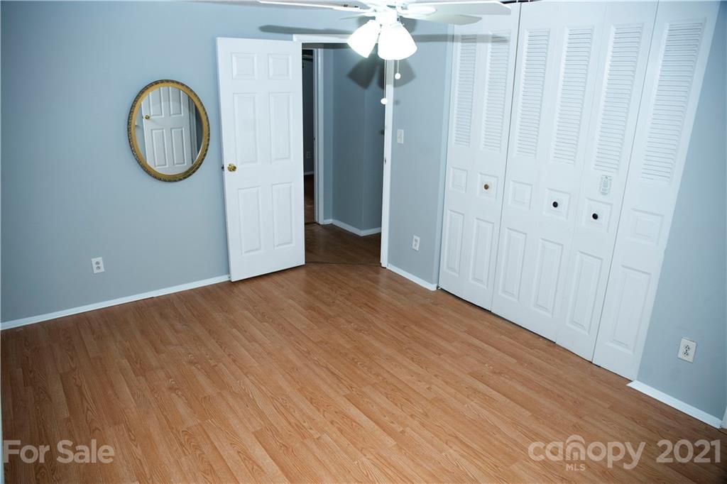3307 Piney Grove Road Charlotte, NC 28212 - Photo 11 of 48 a view of room with wooden floor