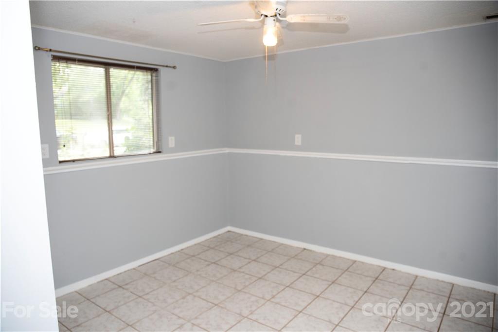 3307 Piney Grove Road Charlotte, NC 28212 - Photo 24 of 48 an empty room with a window