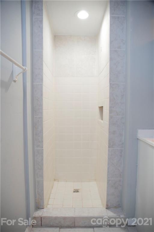 3307 Piney Grove Road Charlotte, NC 28212 - Photo 34 of 48 a bathroom with a shower