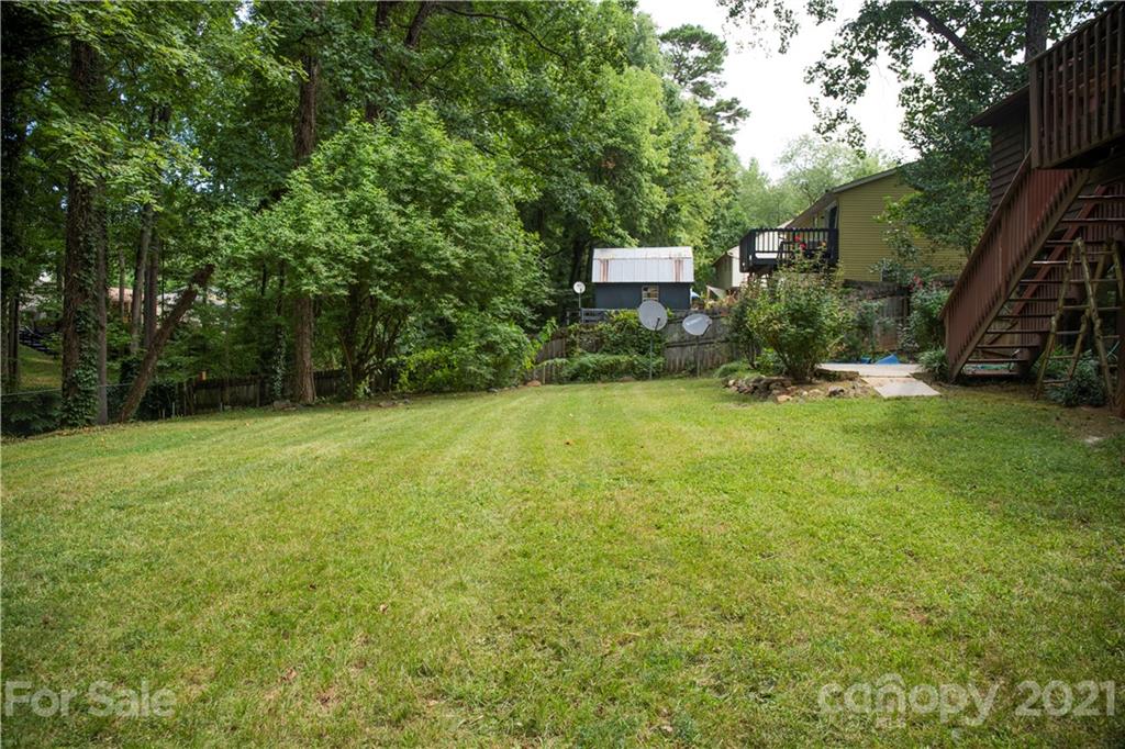 3307 Piney Grove Road Charlotte, NC 28212 - Photo 36 of 48 a view of a house with a backyard