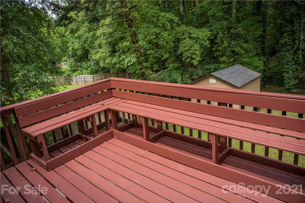 3307 Piney Grove Road Charlotte, NC 28212 - Photo 45 of 48 a view of a roof deck with wooden floor and fence