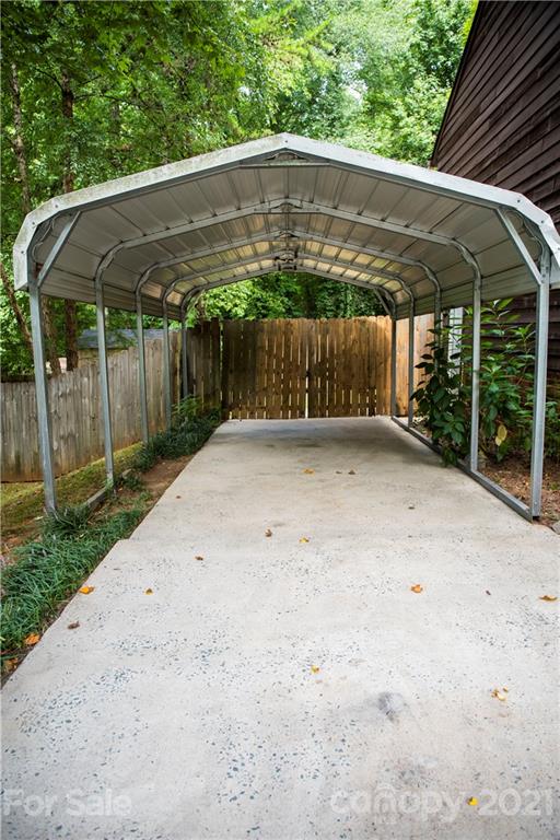 3307 Piney Grove Road Charlotte, NC 28212 - Photo 48 of 48 a backyard of a house with a small yard