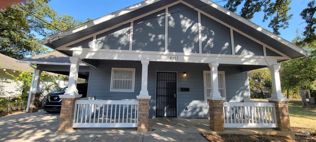 a front view of a house with porch