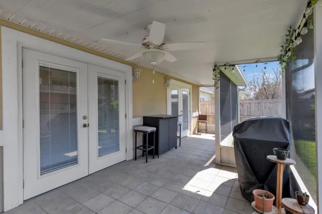 wooden floor in an empty room with a fireplace