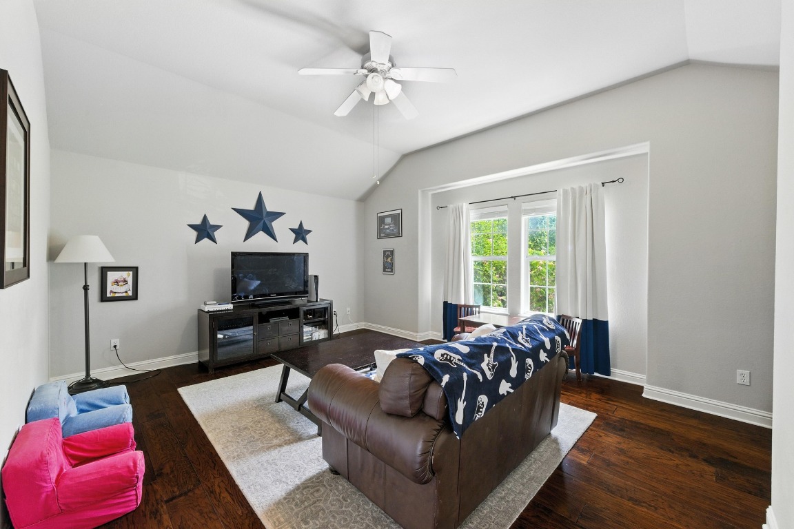316 Caraway Kyle, TX 78640 - Photo 25 of 39 Bonus/game/2nd living room upstairs with continued wood floors.