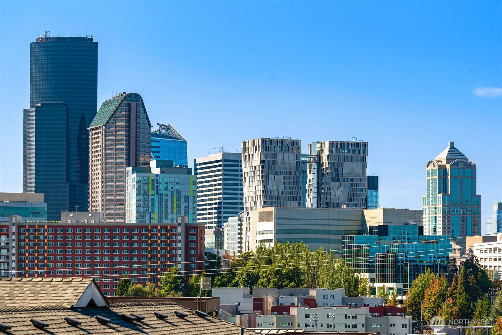 701 17th Avenue, Unit 305 Seattle, WA 98122 - Photo 2 of 36 a view of a city with tall buildings